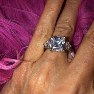 Diamond cubic zirconia rhodium dipped ring.